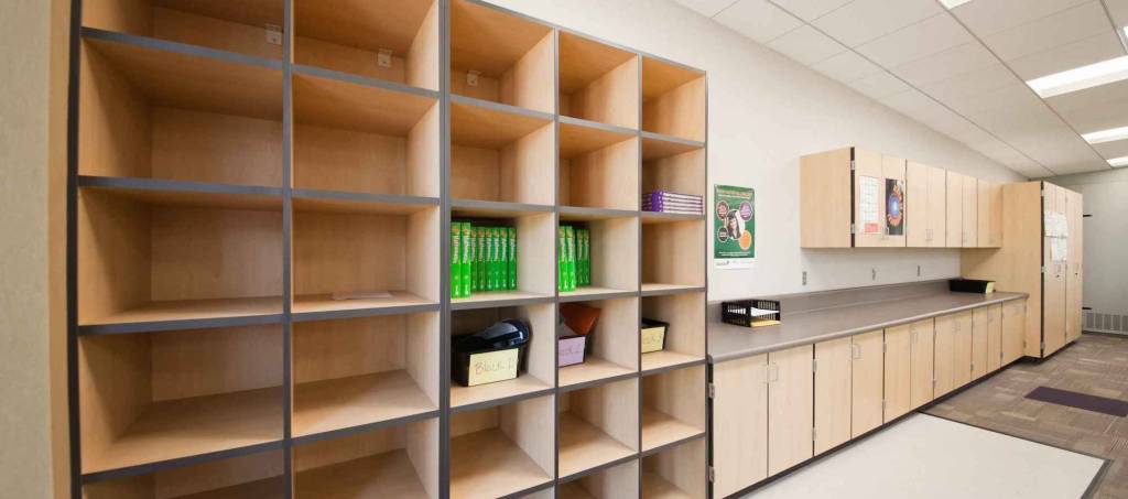 A room with shelves and cabinets, providing storage space for various items.