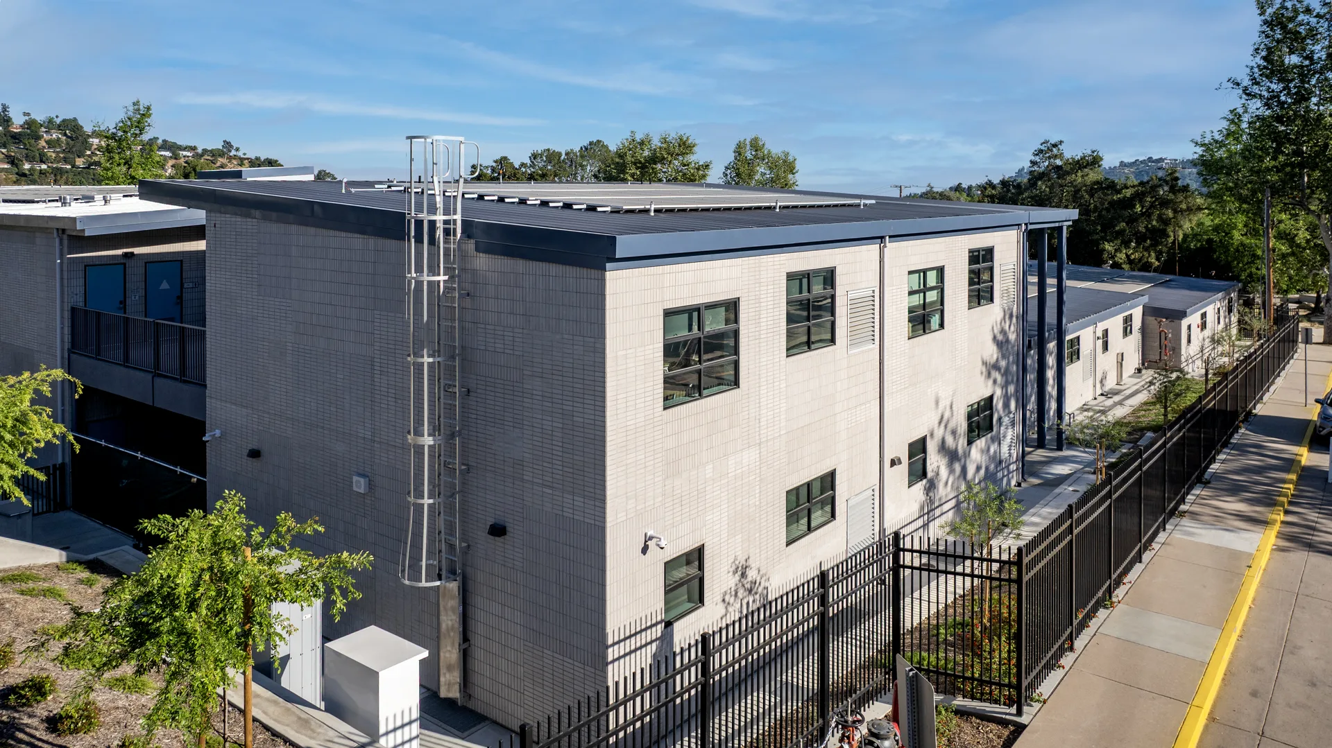 Two-story AMS modular building at Paradise Canyon Elementary School stepping with the sloped foothill site